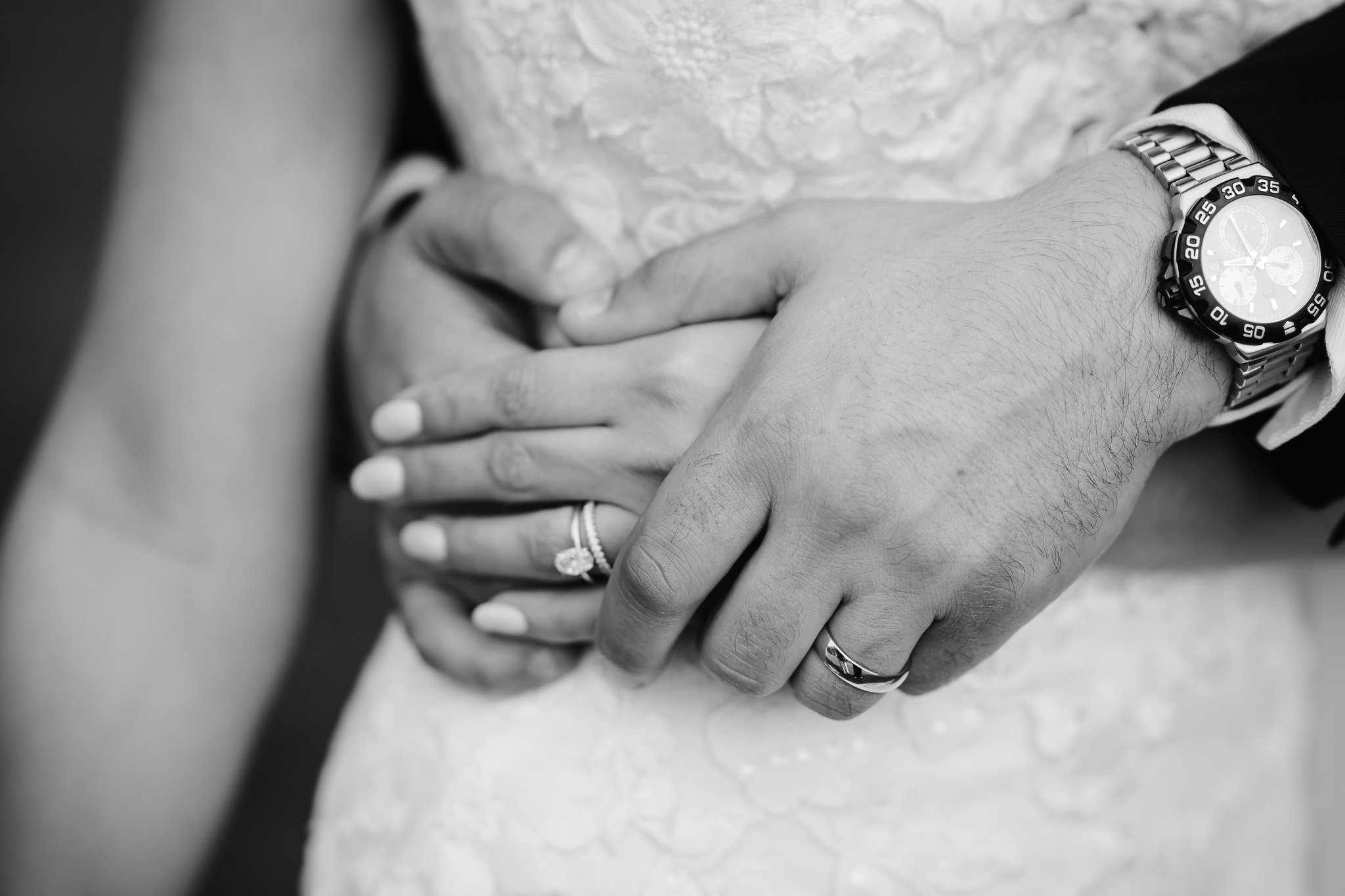 Editorial Wedding Photographer in St Albans | Shrigley Photography & Film - SHRIGLEY Bride & Grooms hand close up showing wedding rings in black and white - Editorial Wedding Photographer in St Albans | Shrigley Photography & Film